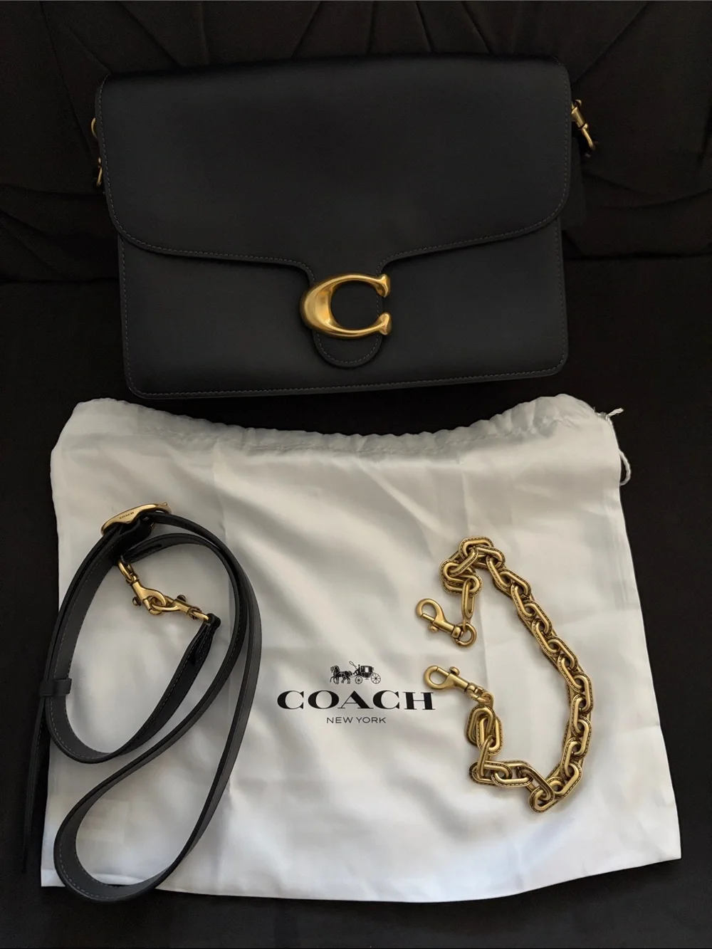 Coach sleek black
